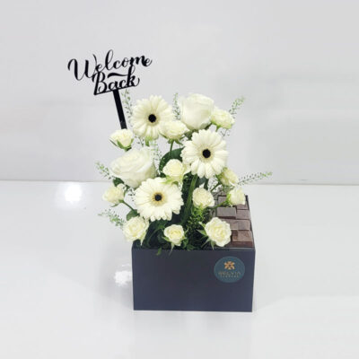 welcome back white box flowers